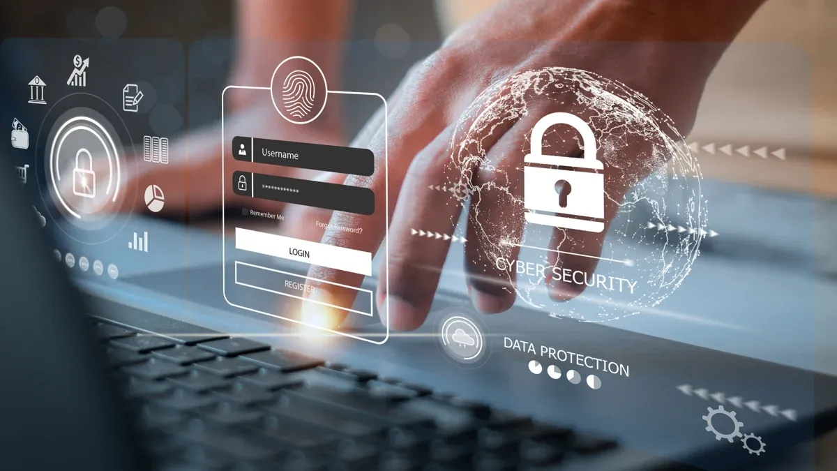 Main sur un clavier avec des icônes de cybersécurité et de protection des données